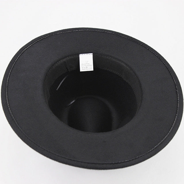 Black felt wide-brim hat with inner lining and center label.