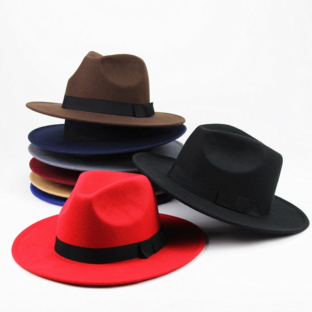Set of retro wide-brim hats in brown, blue, red, and black with dark bands.