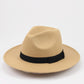 Camel tan wool felt wide-brim jazz hat with black band.