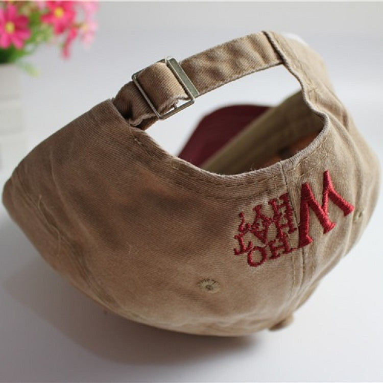Khaki canvas baseball cap with embroidered lettering on side
