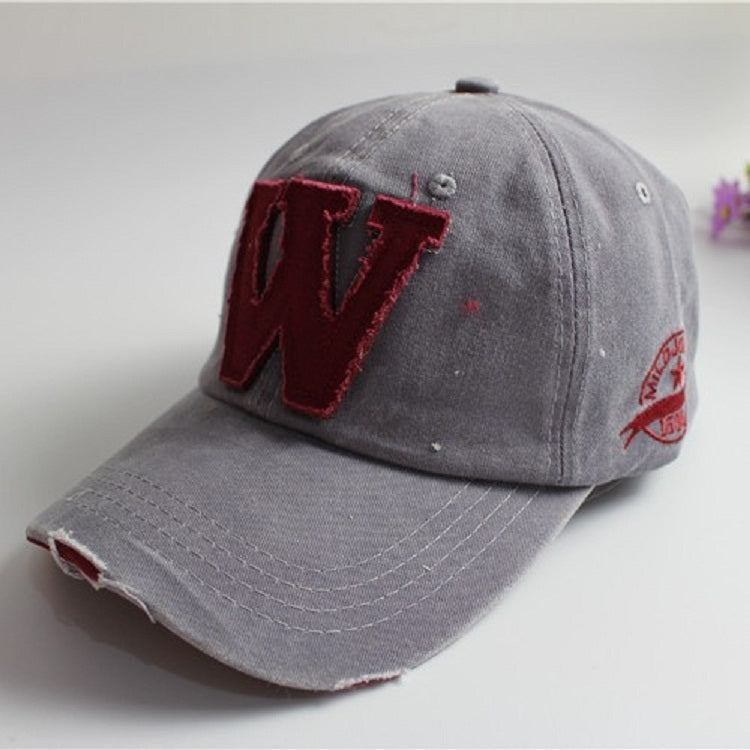 Light grey canvas baseball cap with burgundy 'V' applique and red side badge