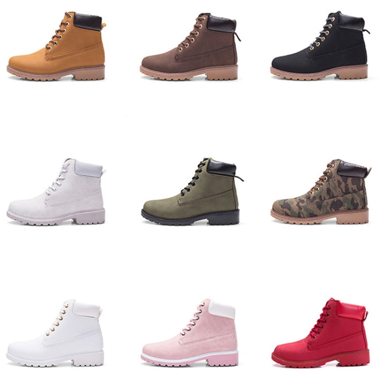 Assorted lace-up Martin boots in multiple colors including white, brown, black, pink