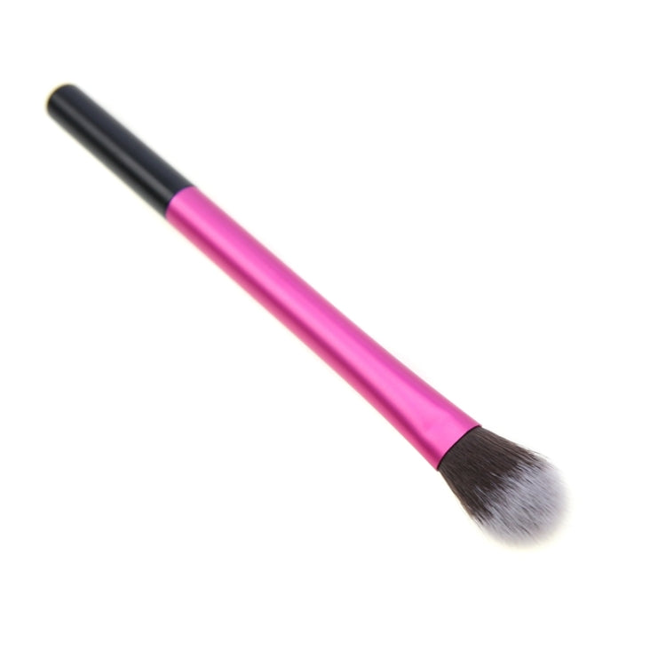 Pink eye shadow brush with black ferrule and rounded bristles, angled view