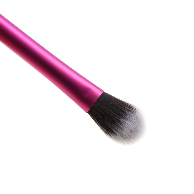 Pink blending brush head with rounded bristles and black ferrule on tube