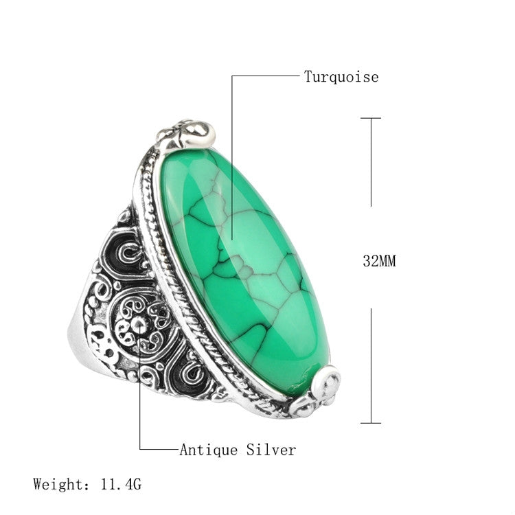 Antique silver oval green turquoise cabochon ring with raised filigree band