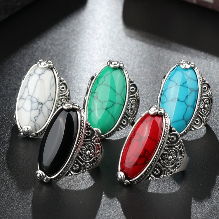 Antique silver oval gemstone rings with turquoise, white, black, and red settings