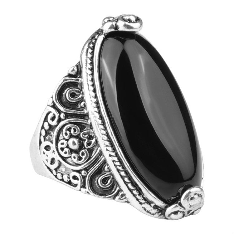 Antique silver oval black cabochon ring with scrollwork setting