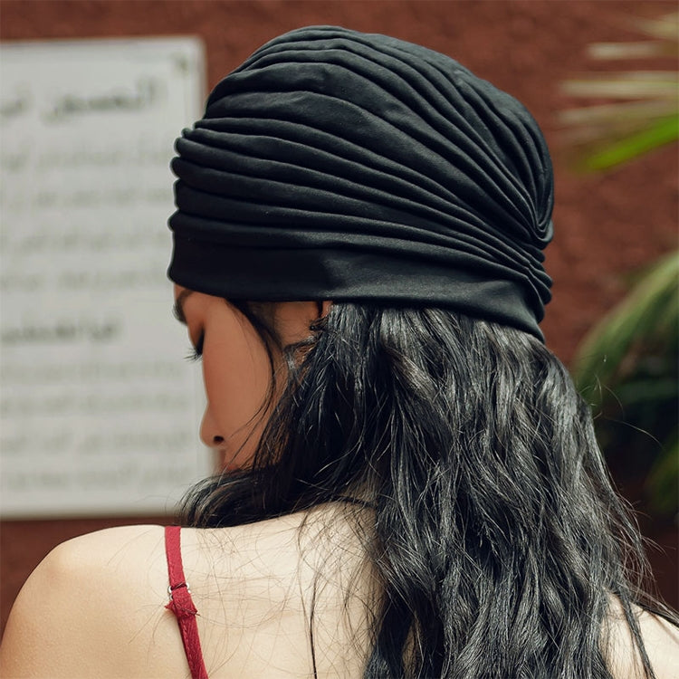 Black turban head wrap, back view with ribbed swirl and full coverage
