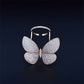 Gold-tone butterfly shape ring with four sparkling crystal wings and open adjustable band