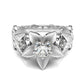 Wide silver wedding ring with central round stone and petal-like diamond settings