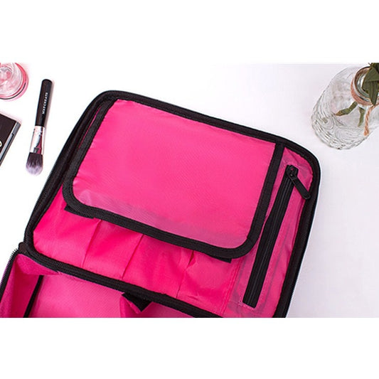 Large pink cosmetic bag with zip opening and clear mesh pocket panel, open interior.