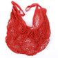 Red knit mesh string tote bag with loop handles and open net weave