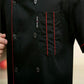 Black chef jacket front with chest pocket and red piping trim, double-breasted buttons