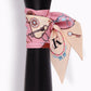 Small letter tarot scarf, pink and tan print with dark icons, letter R