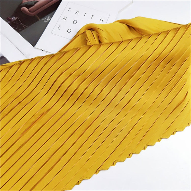 Yellow pleated square silk scarf with vertical pinstripes and folded scalloped edge