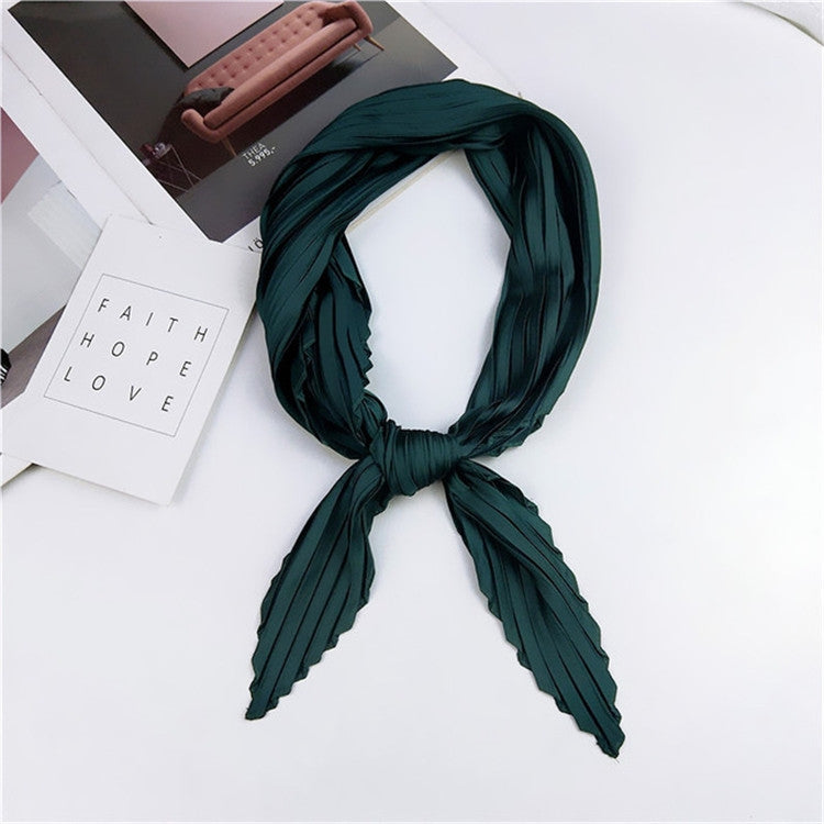 Dark teal pleated square silk scarf, looped knot with vertical pinstripe long ends