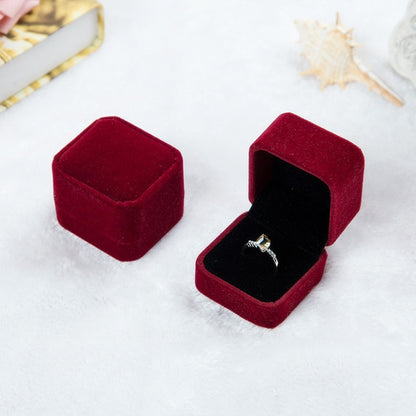 Dark red velvet ring jewelry box, closed and open with ring inside