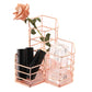 Rose gold hexagonal wire organizer with clear side bin and black cup-like holders inside