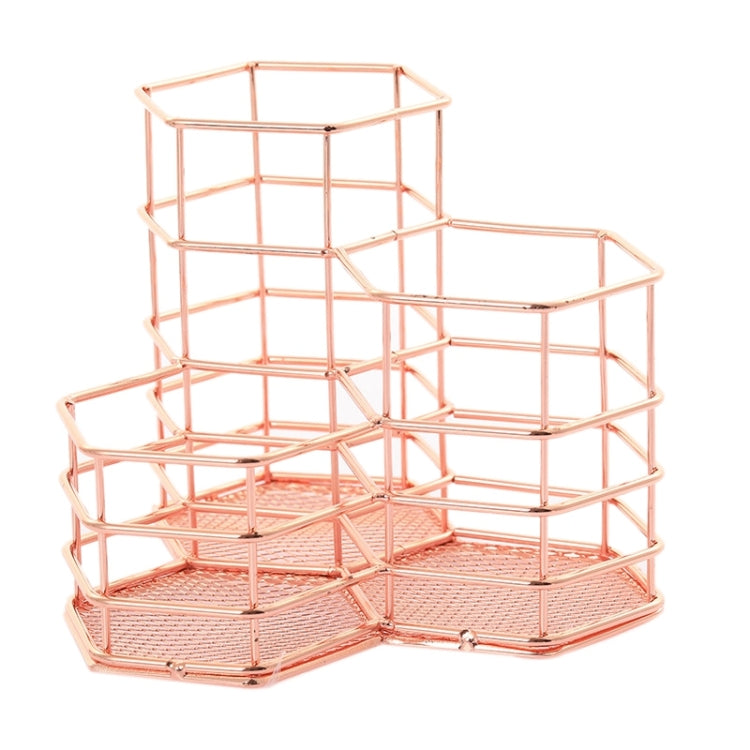 Rose gold hexagonal wire desk organizer with open multi-compartment shelves and mesh bottoms