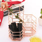 Rose gold hexagonal organizer with clear acrylic bins and black brush pen holders inside