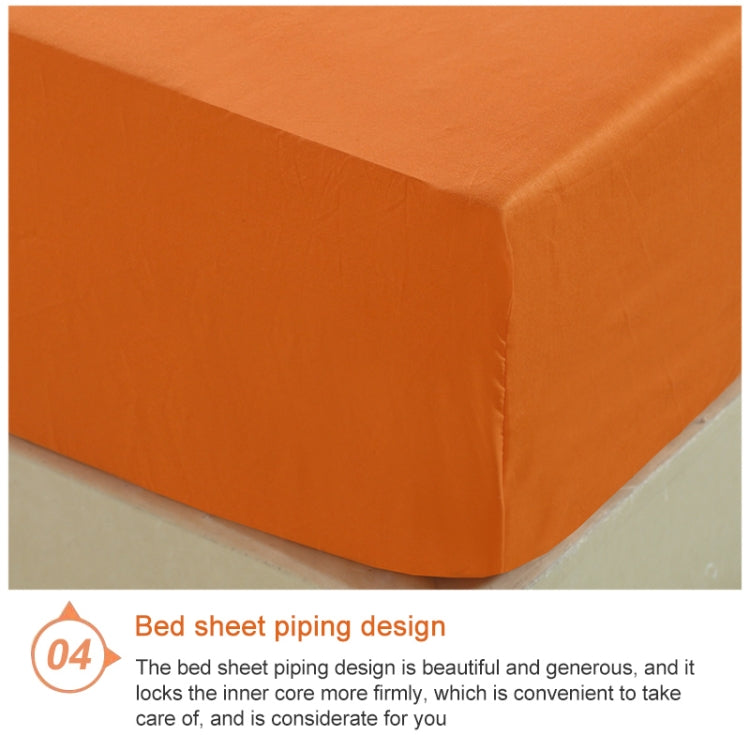 Orange fitted mattress protector corner with neatly stitched piping along the edge