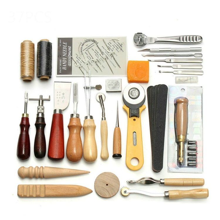 Leather sewing craft tool set layout with spools, awls, needles, and measuring card