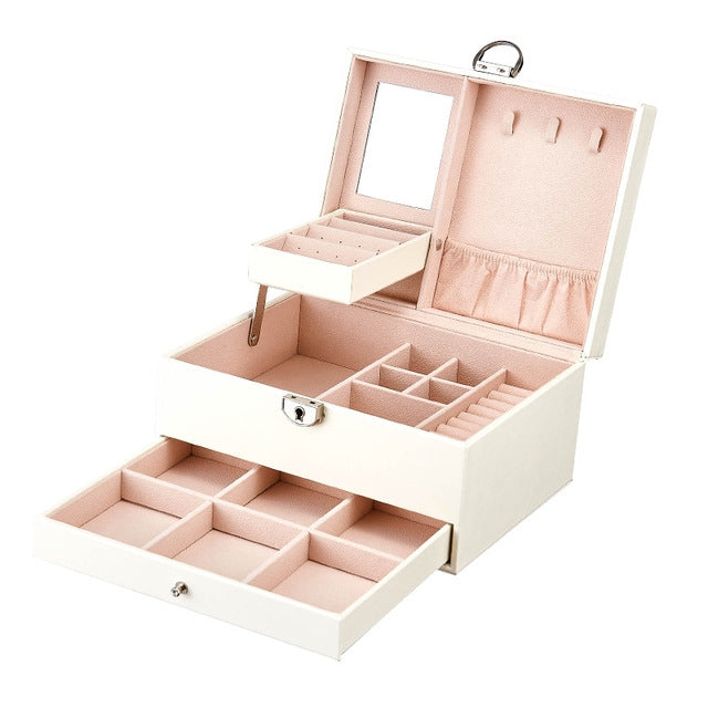 White multi-layer jewelry storage box with open compartments and pink insert lining