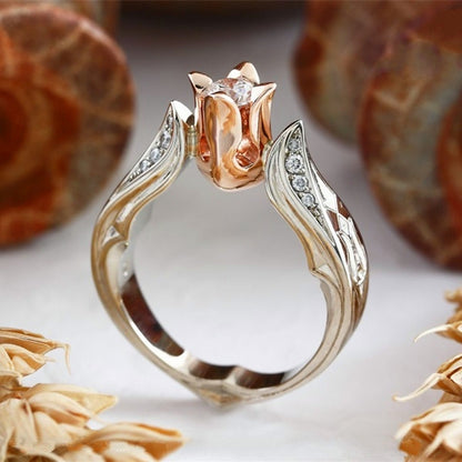 Two-tone rose flower diamond ring with round center stone and openwork band