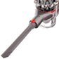 Gray crevice tool attachment with red button, vented side panel
