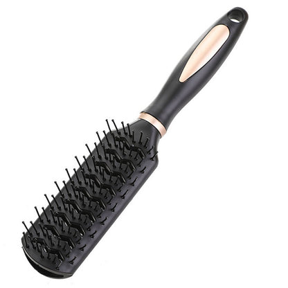 Black airbag hair massage brush with oval paddle and silver pins on a curved handle.