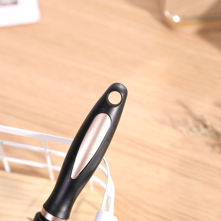 Black hair curler brush handle with oval hole detail and curved design.
