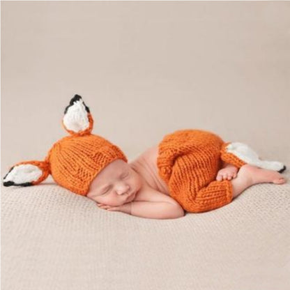 Orange knit fox beanie and pants set for babies, cartoon ear accents
