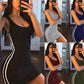 Sleeveless bodycon mini dress with striped side panels, shown in black and other colors