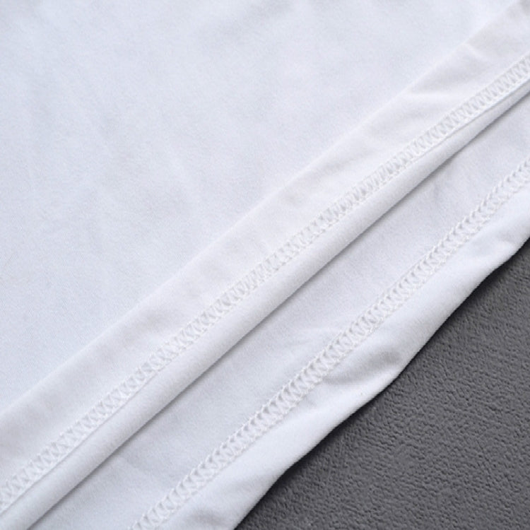 White T-shirt hem close-up with stitched edge and side seam