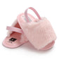 Pink faux-fur soft-sole crib sandals with adjustable strap, open toe