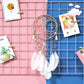 Sun and moon dream catcher hanging decoration with multicolor hoops and white feathers