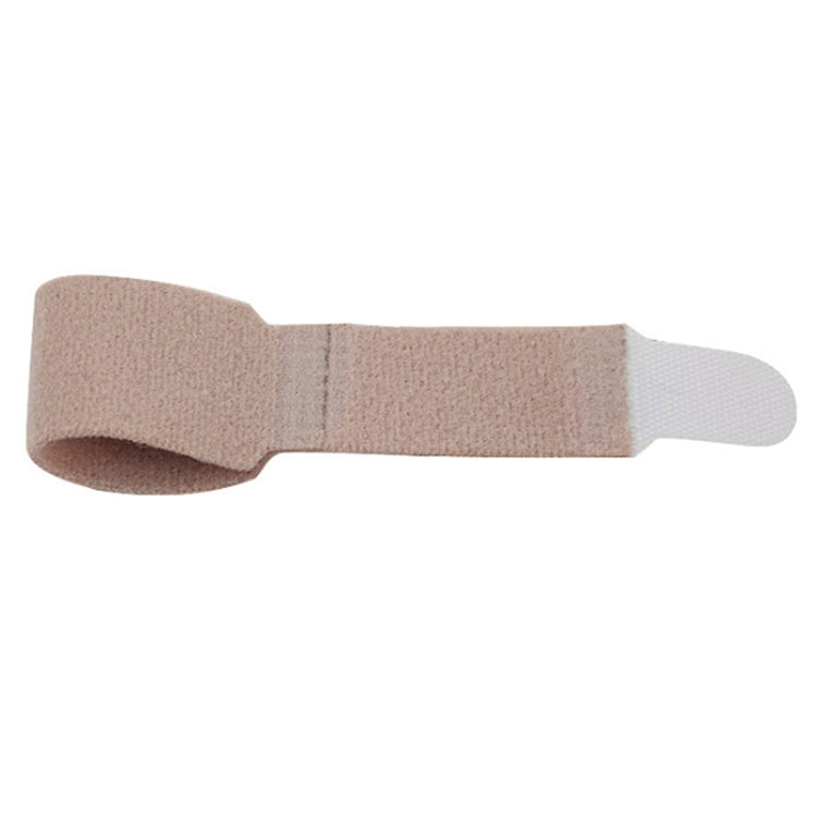 Beige toe straightener splint with white end pad and fabric strap