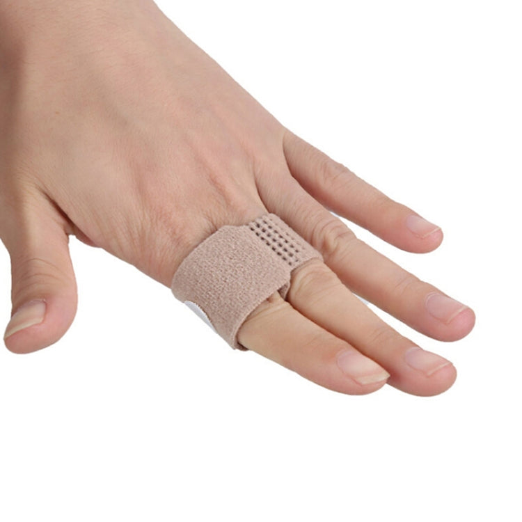 Beige toe separator splint with hook-and-loop strap worn across toes