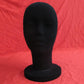 Black foam mannequin head display stand, back view