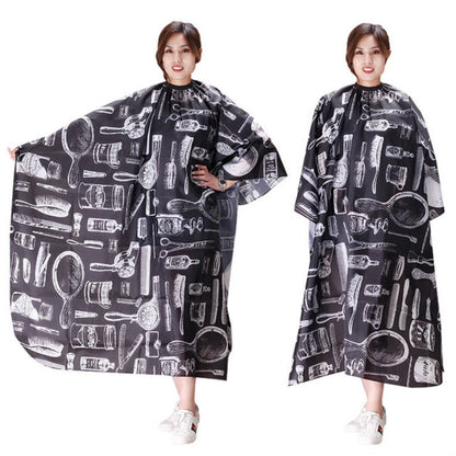 Adult hair-cutting apron, black with white grooming tool print, full cape coverage