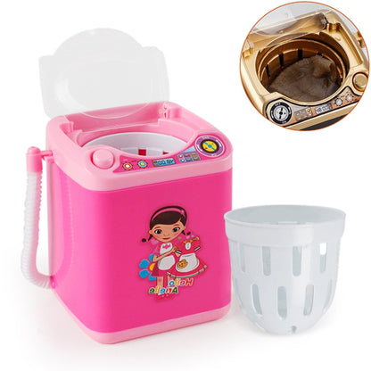 Kids mini toy washing machine in pink with open lid and gray drain basket