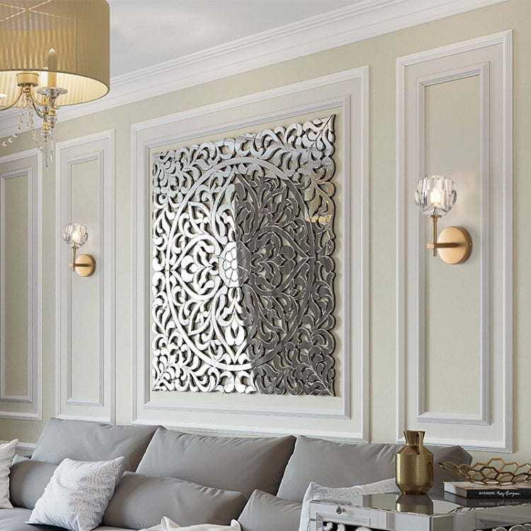 Gold wall lamps with crystal shades and circular wall plates