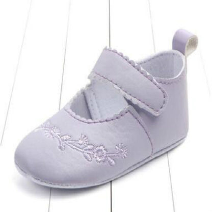 Baby girl first walker crib shoes in light purple with hook-and-loop strap and floral embroidery