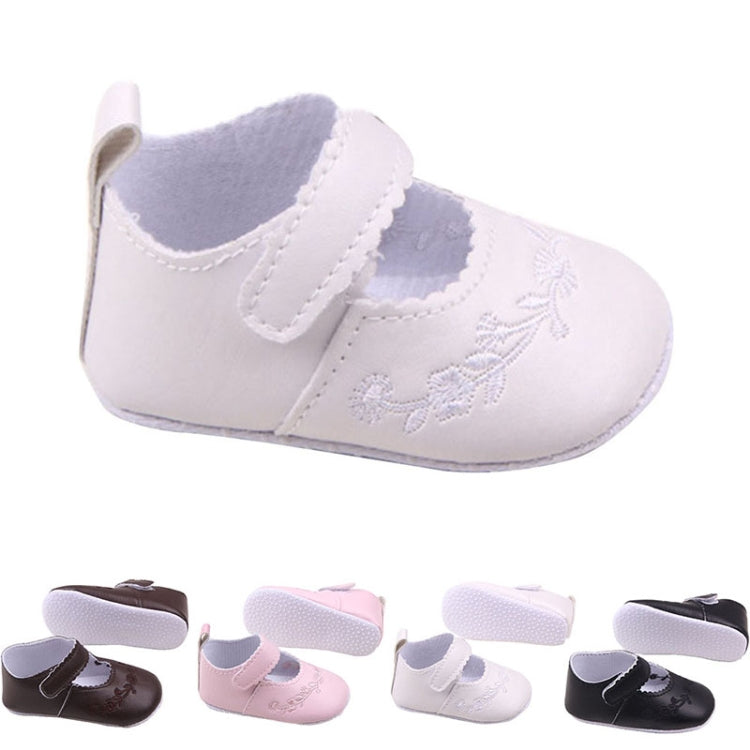 Baby girl first walker crib shoes in pale pink with hook-and-loop strap and floral embroidery