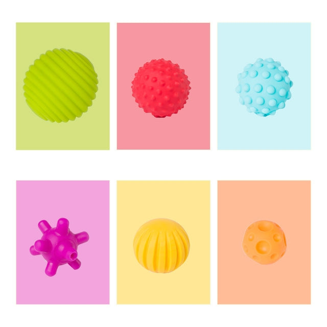 Six colorful textured rubber bath balls: green, red, blue, purple, yellow, orange