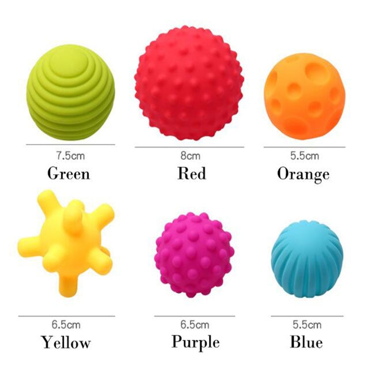 Assorted colored textured rubber bath balls with size labels