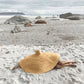 Beige wide-brim woven straw sun hat with deep crown