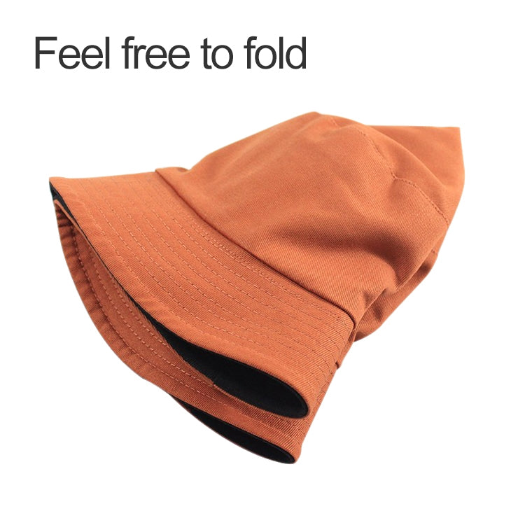 Orange cotton fisherman hat with wide brim and dark underside