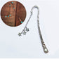 Silver metal bookmark with ornate end and star charm chain