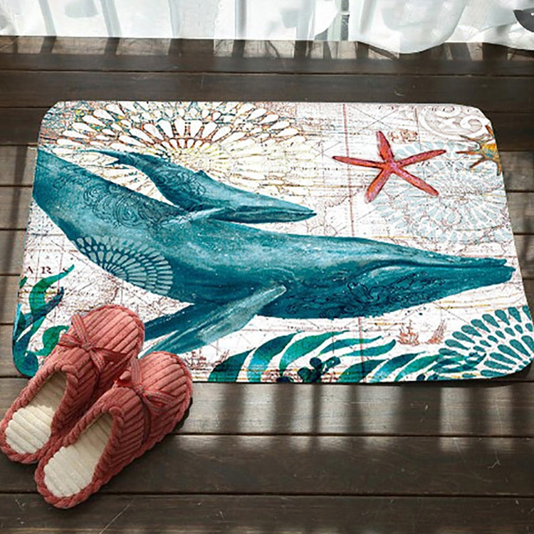 Marine-pattern toilet mat with blue whale, starfish, and shell graphic, non-slip backing